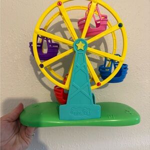 Peppa Pig Yellow Ferris Wheel Toy with Teal Base and Multicolor Seats
